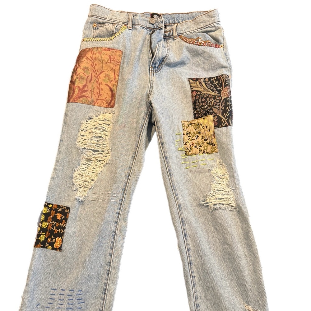 Distressed Light Blue Jeans with Floral Patch